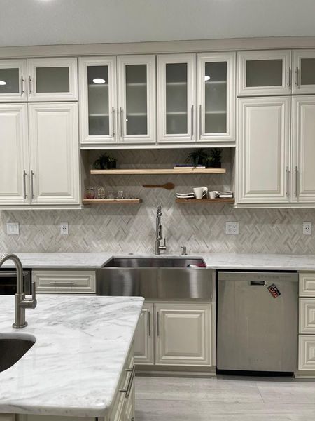 Bianco Avion Quartzite countertops.